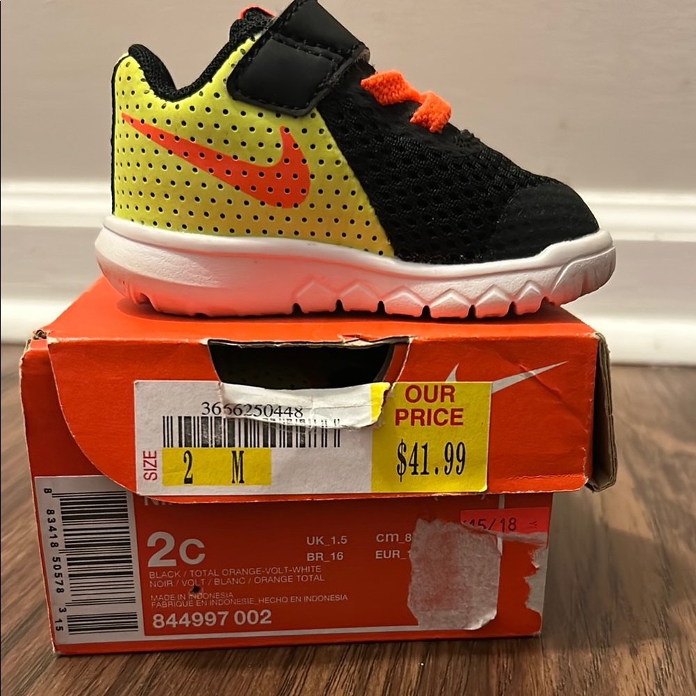 Nike Black and Orange Sneakers with Breathable Mesh